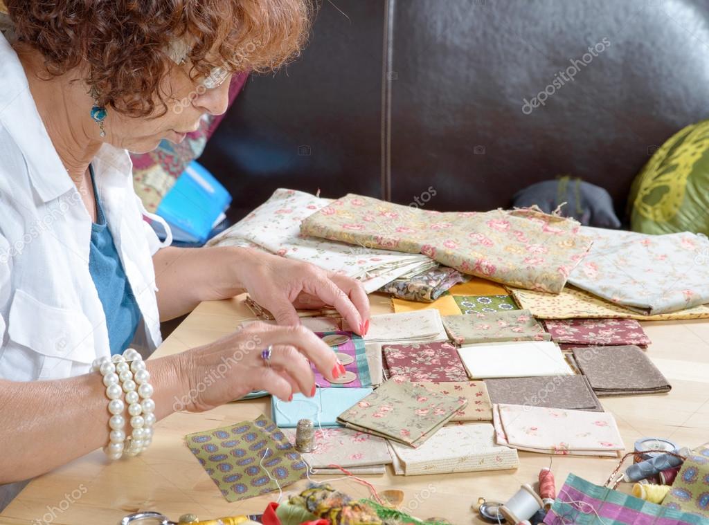 a woman sewing a patchwork