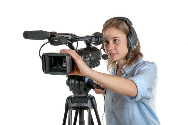 Jeune femme avec une caméra vidéo — Photo
