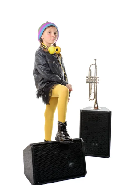 A little girl with his trumpet waits his turn — Stock Photo, Image