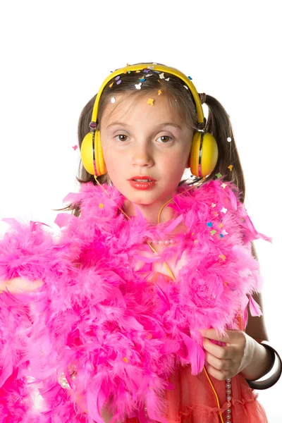 A pretty little girl with a pink feather boa — Stock Photo, Image