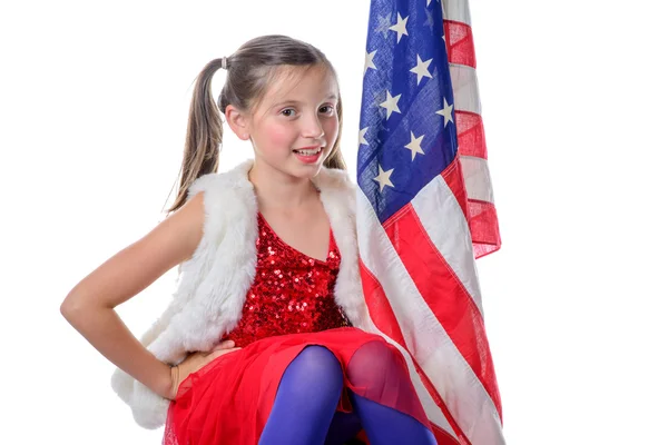 Una niña bonita con una bandera americana —  Fotos de Stock