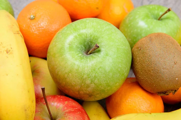 Close up of various seasonal fruits — Stock Photo, Image