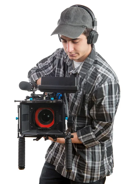 Jovem cameraman com câmera profissional — Fotografia de Stock
