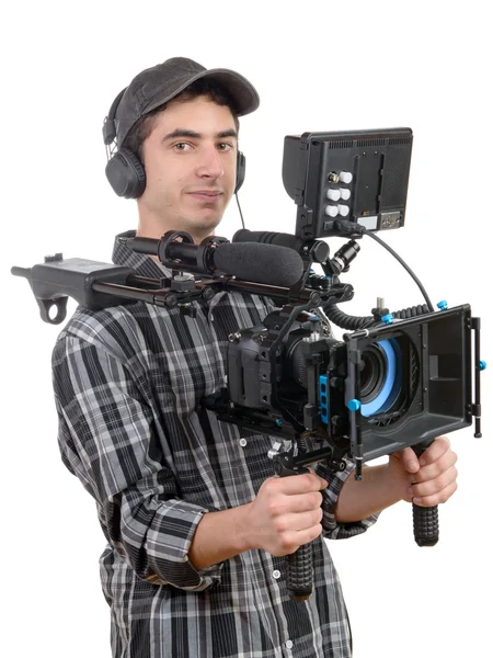 Young cameraman with professional camera — Stock Photo, Image