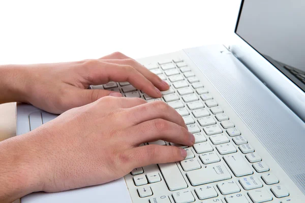 Close up of a man's hands to the computer — Stock Photo, Image
