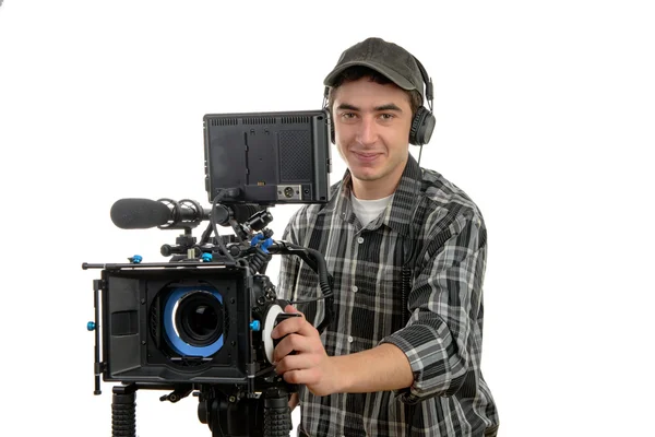 Jonge cameraman met filmcamera — Stockfoto