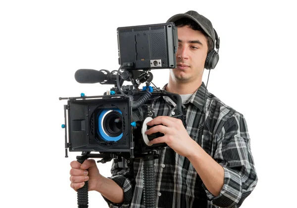 Jonge cameraman met professionnal filmcamera — Stockfoto