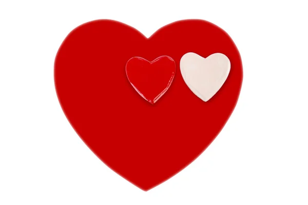 Duże czerwone serce i dwie małe serce na Walentynki — Zdjęcie stockowe