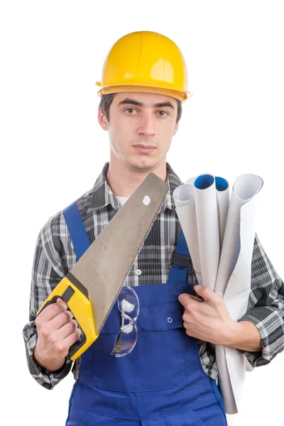 Junger Arbeiter mit der Handsäge — Stockfoto