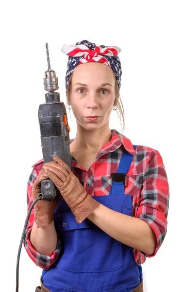 Vintage pretty young woman with a drill — Stock Photo, Image