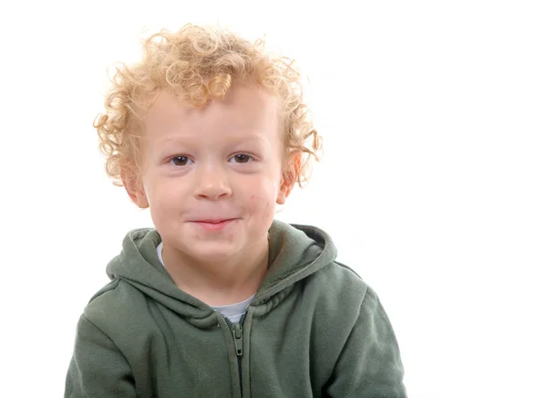 Retrato de un niño de 3 años con un abrigo verde —  Fotos de Stock