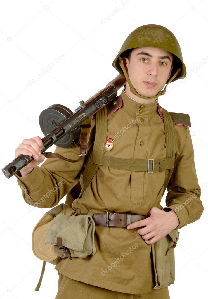 young Soviet soldier with machine gun