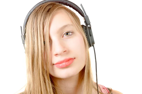 Портрет дівчини-підлітка з навушниками — стокове фото