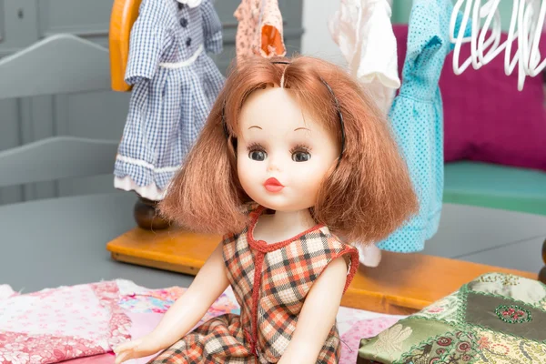 Doll with red hair and  dresses — Stock Photo, Image