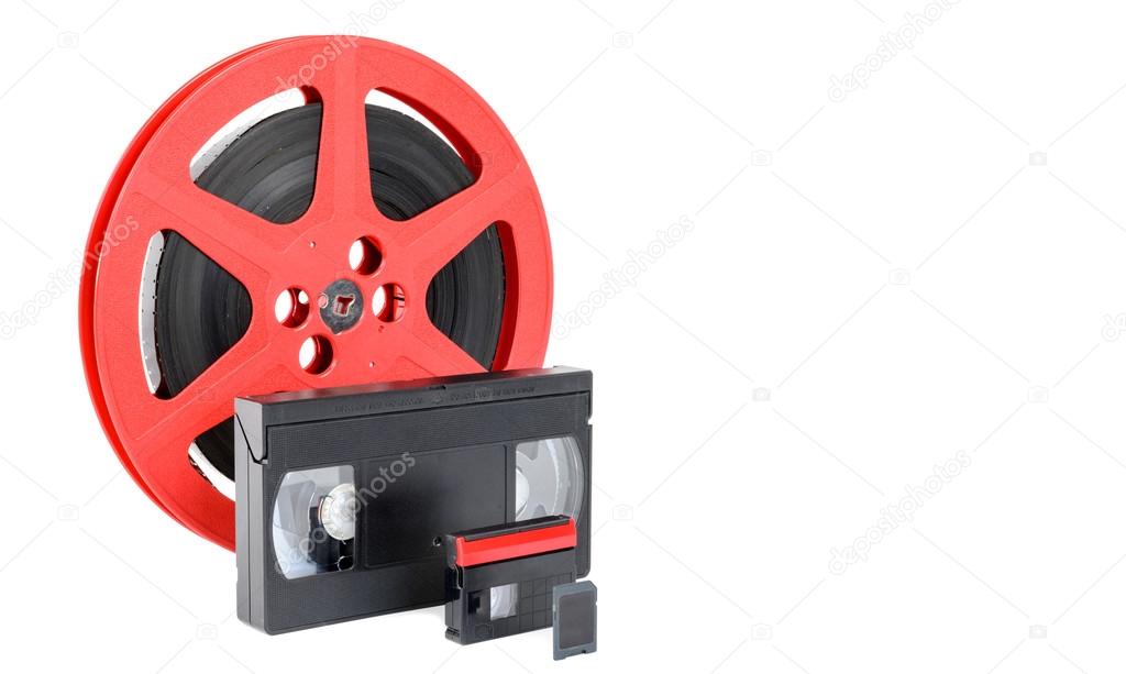 old reel of film, video tape and memory card