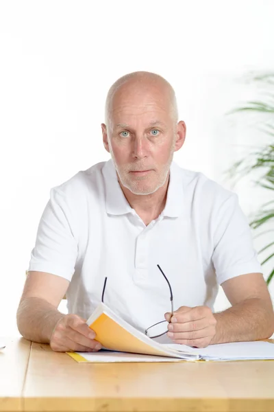 Portrait of a middle-aged man in his office — Stock Photo, Image