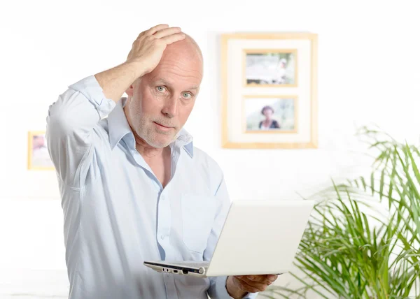 Portrait of a middle-aged man in his office — Stock Photo, Image