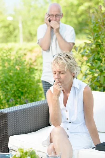 A woman jealous of her husband — Stock Photo, Image