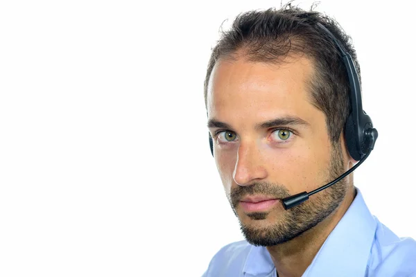 Knappe klant dienst exploitant dragen een headset — Stockfoto