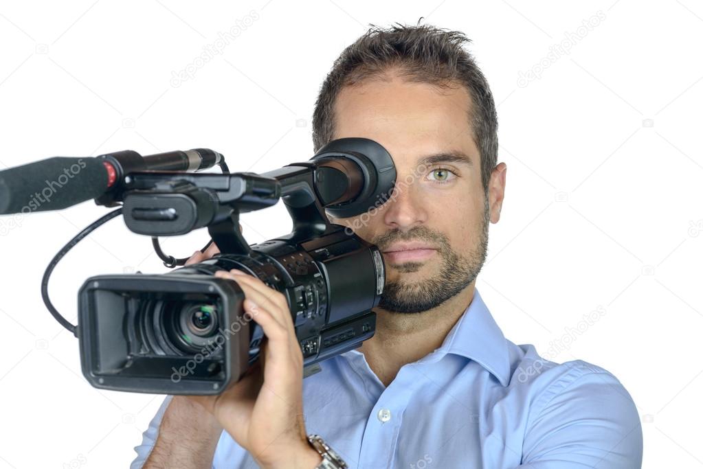 a young man with professional movie camera