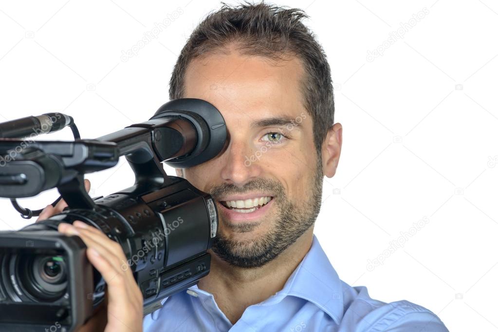 a young man with professional movie camera