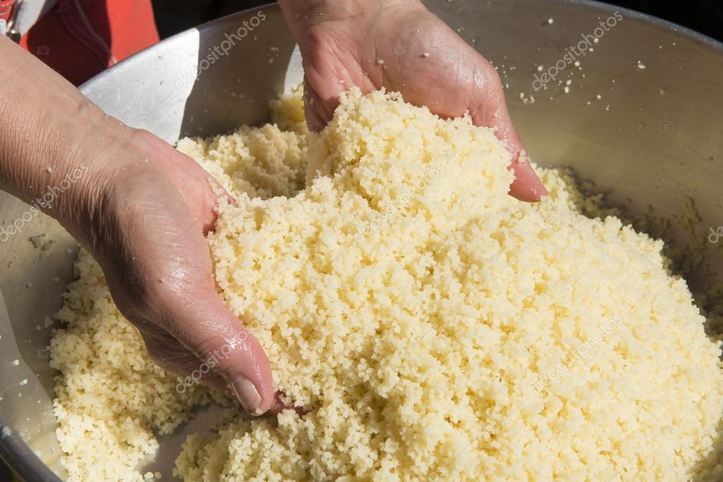Preparation of couscous with semolina — Stock Photo © philipimage 77332316