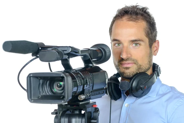 Young man with professional movie camera — Stock Photo, Image