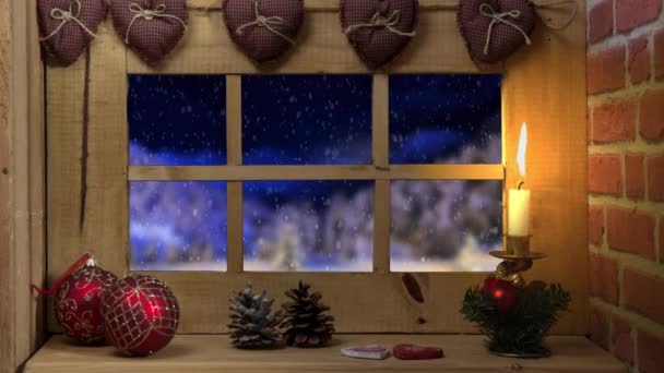 Okno s padajícím sněhem a sáně Santa Claus