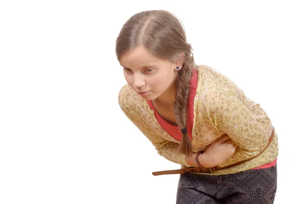 Jeune fille avec mal de ventre isolé sur fond blanc — Photo