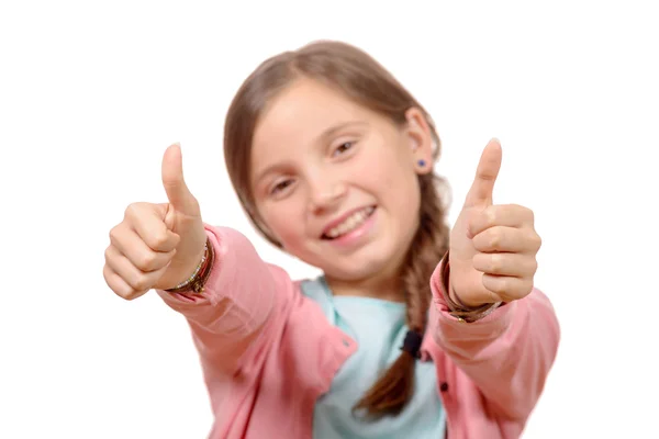 Feliz, sonriente niña pequeña dando el pulgar hacia arriba gesto —  Fotos de Stock