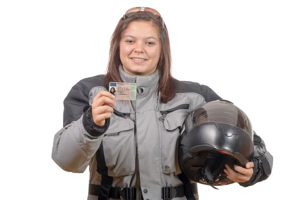 Glad ung kvinna visar stolt sin nya motorcykel licens — Stockfoto