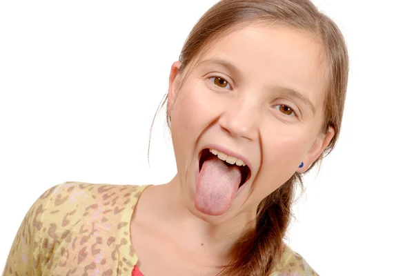 Kislány kioltja a nyelv — Stock Fotó