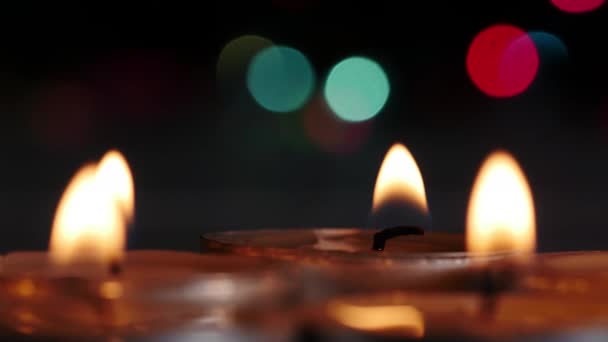 Christmas candle with bokeh — Stock Video