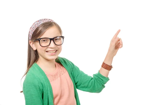 Portrait of a smiling  girl teenager,  finger pointed upward — Stock Photo, Image