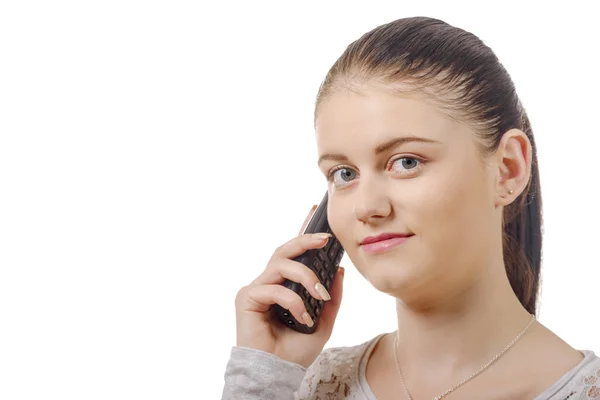 Jonge elegante vrouw praten over telefoon geïsoleerd op witte backgro — Stockfoto