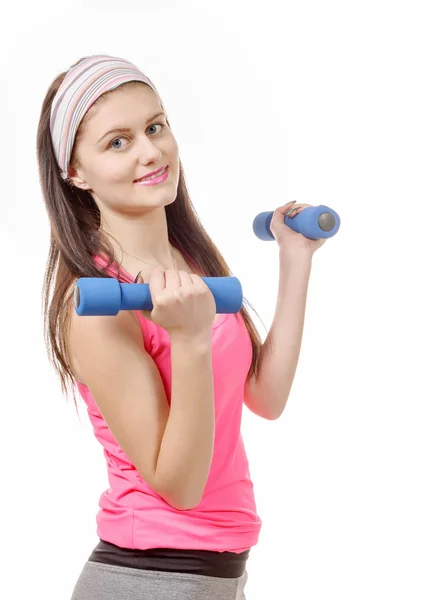Portrait of pretty sporty girl holding weights isolated on white — Stock Photo, Image