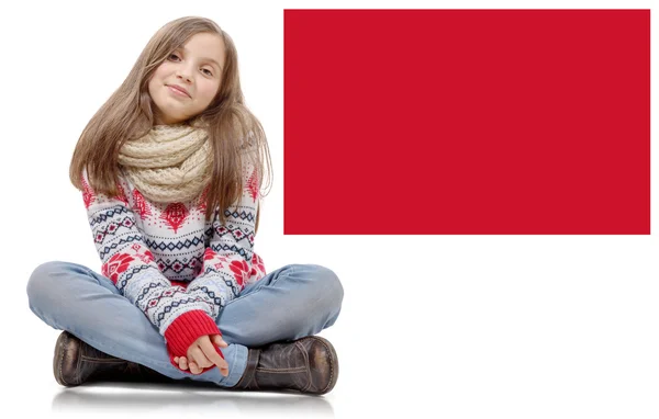 Closeup image of a pretty little girl sitting on the floor. — Stock Photo, Image