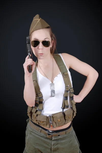 Sexy young woman posing in WW2 military uniform and weapon — Stock Photo, Image