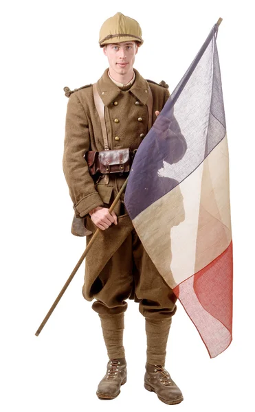 1940 french soldier with a flag isolated on a white background — Stock Photo, Image