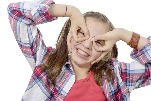 Drôle petite fille faire des visages — Photo