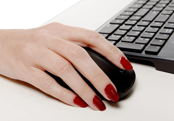 Close-up of businesswoman's hand on mouse — Stock Photo, Image