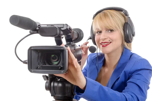 Bela jovem com uma câmera de vídeo profissional e cabeça — Fotografia de Stock