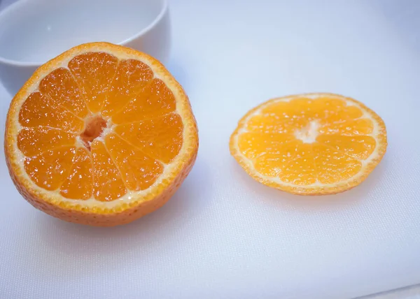 Perfectly retouched sliced orange isolated on the white background with clipping path.One of the best isolated oranges slices that you have ever seen.