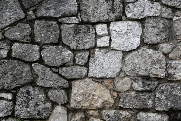 Фон кладки различных размеров на стене или на дороге — стоковое фото