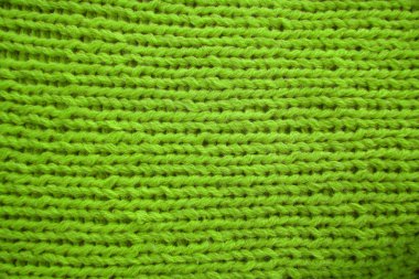  yün el örgüsü bir örme kumaş açık yeşil arka plan doku
