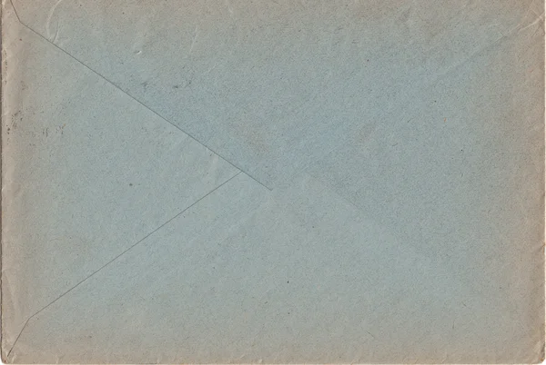 古い郵便封筒ブルー グレー色、ビンテージ紙の質感の背面側 — ストック写真