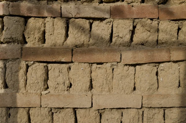 Close up van oude bevuilde bakstenen muur in Bulgarije — Stockfoto