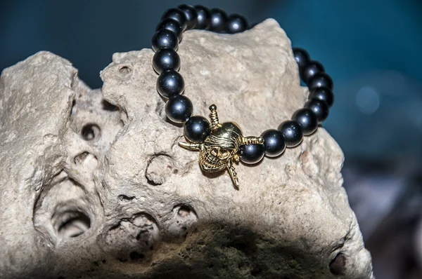 Skull figure men bracelet — Stock Photo, Image