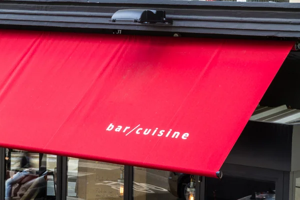 Bar Cuisine on red awning — Stock Photo, Image