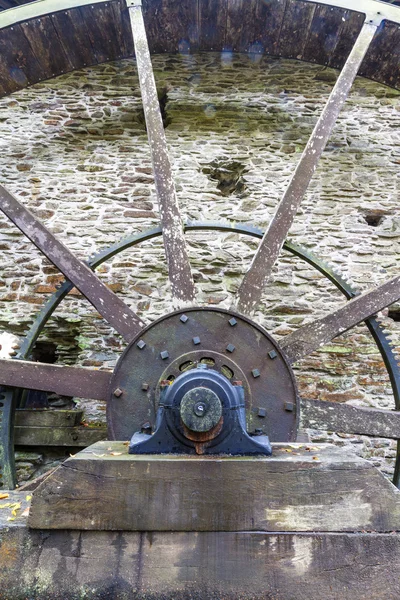 Axle and spokes of water wheel.